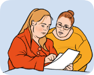 Two women looking at a piece of paper together